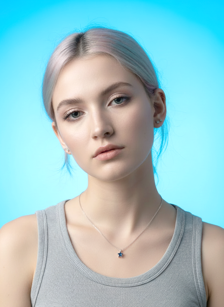woman wearing sterling silver star necklace minimal symbolic transformation jewelry